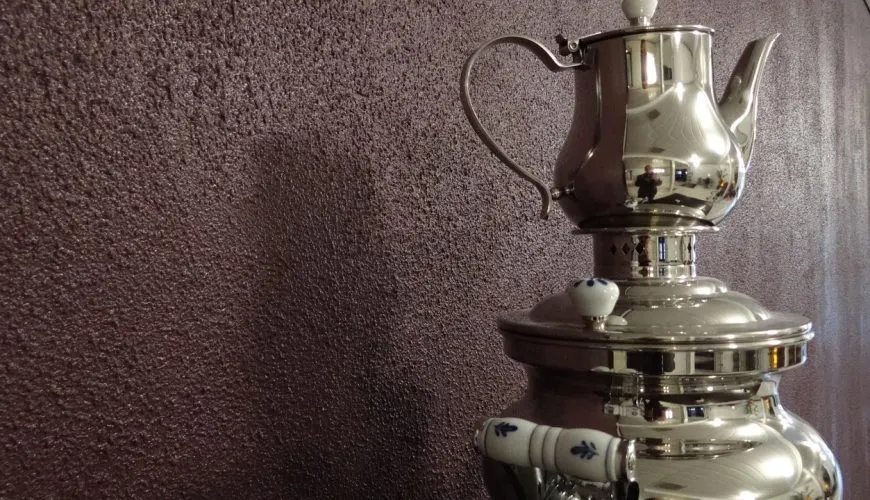 Silver samovar and teapot for serving tea